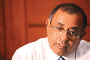 P.B. Jayasundere bows to British system