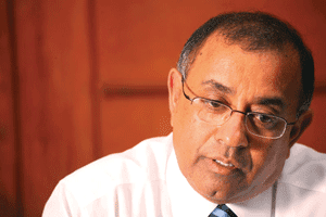 P.B. Jayasundere bows to British system